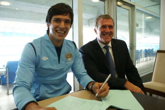 New Manchester City signing Roque Santa Cruz is unveiled by the Premier League side