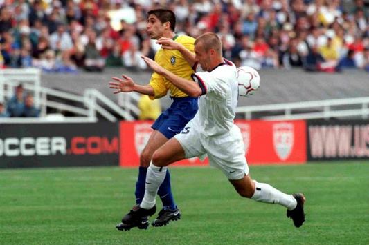 Clint Mathis and Sylvinho, Brazil-USA 2001 (EMPICS)