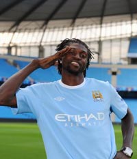 Emmanuel Adebayor in high spirits after joining Manchester City from Arsenal