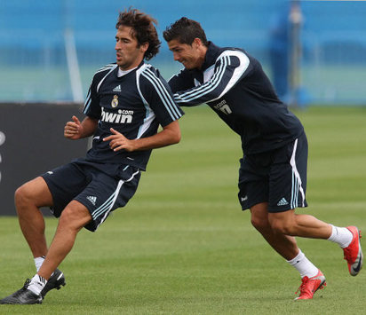 Raul and Cristiano Ronaldo enjoy a Real Madrid training session
