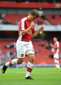 Andrey Arshavin nets twice late on to see Arsenal past Atletico Madrid (PA)