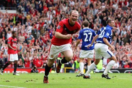 Manchester United striker Wayne Rooney celebrates his goal against Blackburn Rovers at Old Trafford
