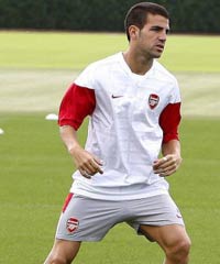 Arsenal midfielder Cesc Fabregas trains hard ahead of the Champions League play-off clash with Celtic