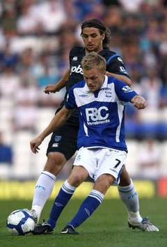 İngiltere: Sebastian Larsson (Birmingham City) - Niko Kranjcar (Portsmouth) (PA)