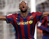 Barcelona's Seydou Keita celebrates his strike against Sporting Gijon
