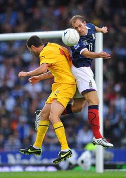 WCQ: Filip Despotovski - Steven Whittaker, Scotland v FYR Macedonia (PA)