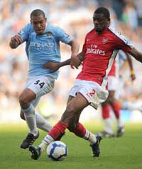 EPL: Vassiriki Diaby - Nigel De Jong, Manchester City - Arsenal (PA)