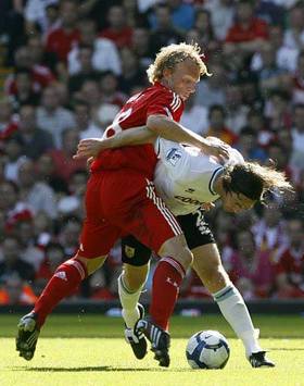 EPL: Dirk Kuyt - Graham Alexander, Liverpool v Burnley (PA)