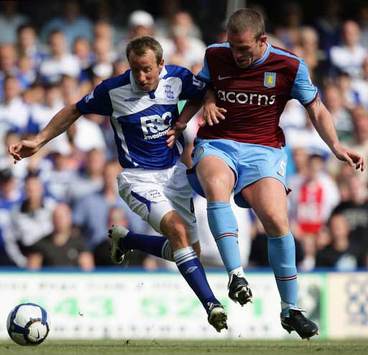 EPL: Lee Bowyer - Richard Dunne, Birmingham City v Aston Villa (PA)