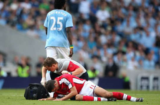 EPL: Robin van Persie - Emmanuel Adebayor, Manchester City - Arsenal (PA)