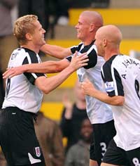 EPL: Paul Konchesky and Damien Duff, Fulham - Everton (PA)