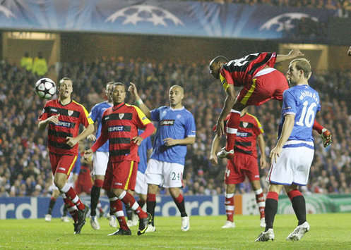 Sevilla's Konko soars high into the air... as does his team when they dispatched Rangers 4-1 (Marca)