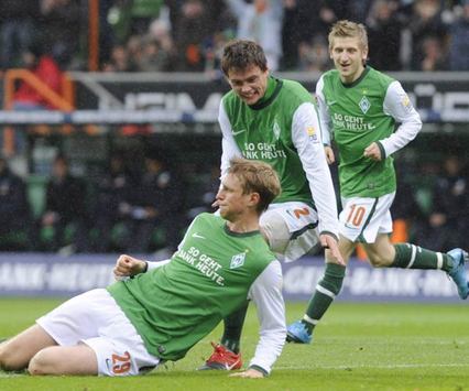 Bundesliga: Werder Bremen - TSG 1899 Hoffenheim - Sebastian Boenisch, Per Mertesacker, Marko Marin (DAVID HECKER/AFP/Getty Images)
