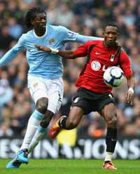 EPL: John Paintsil - Emmanuel Adebayor, Manchester City v Fulham (Getty Images)
