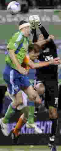 Nate Jaqua, Seattle Sounders FC; Pat Onstad, Houston Dynamo; MLS (Troy Zielonka, Goal.com)