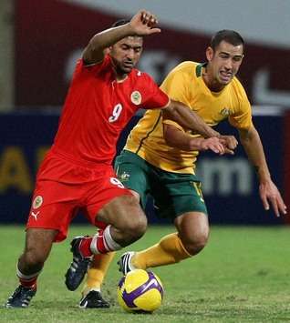 Alaa Hubail of Bahrain battles with Carl Valeri( Australia)(Getty Images)