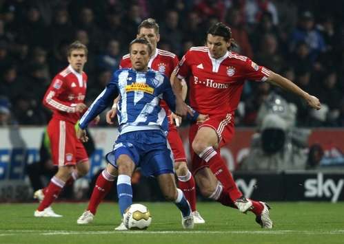 Bundesliga:VfL Bochum - Bayern Munich,  Daniel van Buyten - Stanislav Sestak (Getty Images, Bongarts)