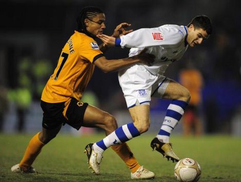 Wolves' Michael Mancienne tussles with Terry Gornell of Tranmere in FA Cup third round action. (Getty Images)