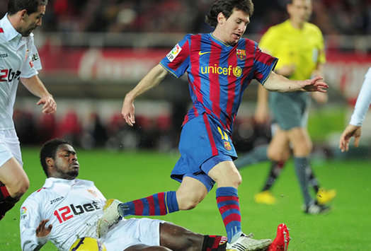 Lionel Messi skips past Romaric, but it's not enough as Barcelona crash out of the Copa to Sevilla (Getty Images)