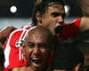 Champions: Benfica celebrates Luisao's gol against Liverpool (AFP)