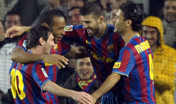 Messi, Henry, Piqué y Rafa Márquez, en plena celebración durante el Barcelona-Sevilla (Getty Images)