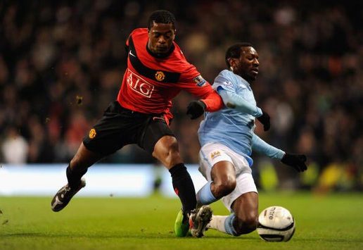 CC: Patrice Evra - Shaun Wright-Phillips, Manchester City - Manchester United (Getty Images)