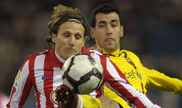 Diego Forlan, Sergi Busquets, Atletico de Madrid, Barcelona (Getty Images)