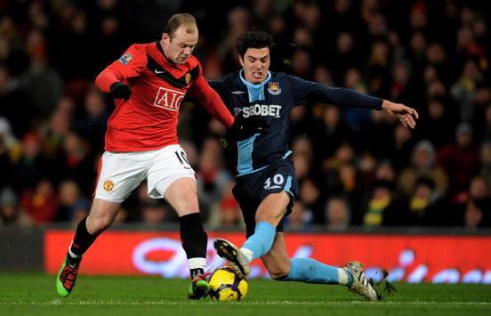İngiltere: James Tomkins (West Ham United) - Wayne Rooney (Manchester United) (Getty Images)