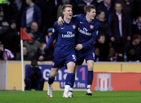 EPL: Nicklas Bendtner is congratulated on his goal by Aaron Ramsey, Stoke City v Arsenal (Getty Images)