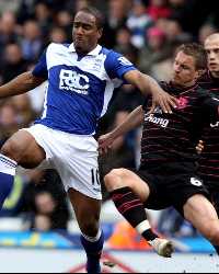 Phil Jagielka of Everton is challenges by Cameron Jerome of Birmingham during the Barclays Premier League match(Getty Images) 800