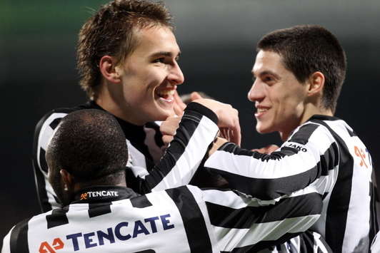 Heracles players celebrating after goal against NAC (photo PROSHOTS)