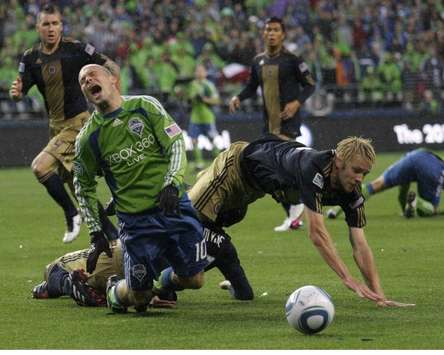 Freddie Ljungberg, Seattle Sounders FC; Toni Stahl, Danny Califf, Philadelphia Union; MLS (Troy Zielonka, Goal.com)