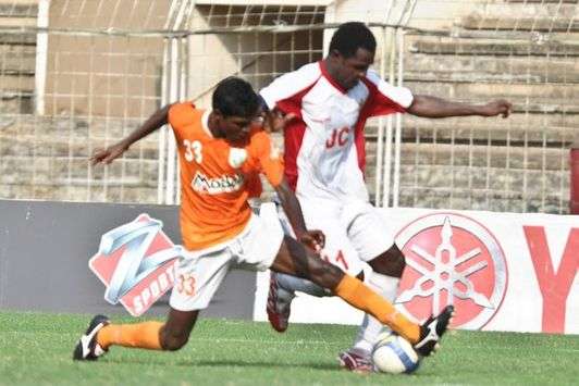 Rowan Pareira of Sporting tries to block JCT's Okoro(Mango Peel)