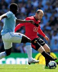 Wayne Rooney - Kolo Toure - Manchester United - Manchester City  (Getty Images)