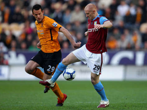 EPL: James Collins - Jan Vennegoor ,  Aston Villa-  Hull City (Getty Images) 